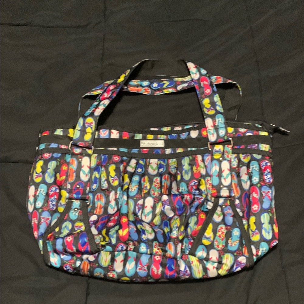 STUDIOSAK- Water-Resistant Bag with colorful flip flops 🩴